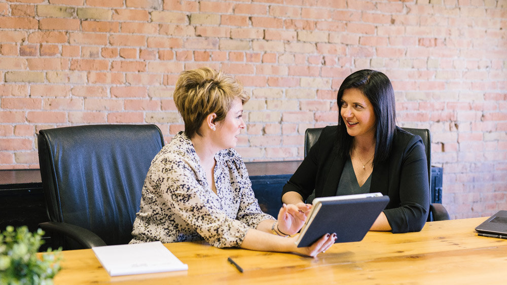 Two women talking