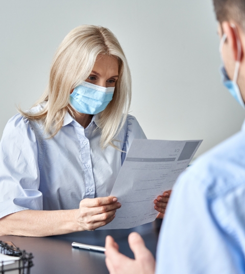 Healthcare professional reading a document